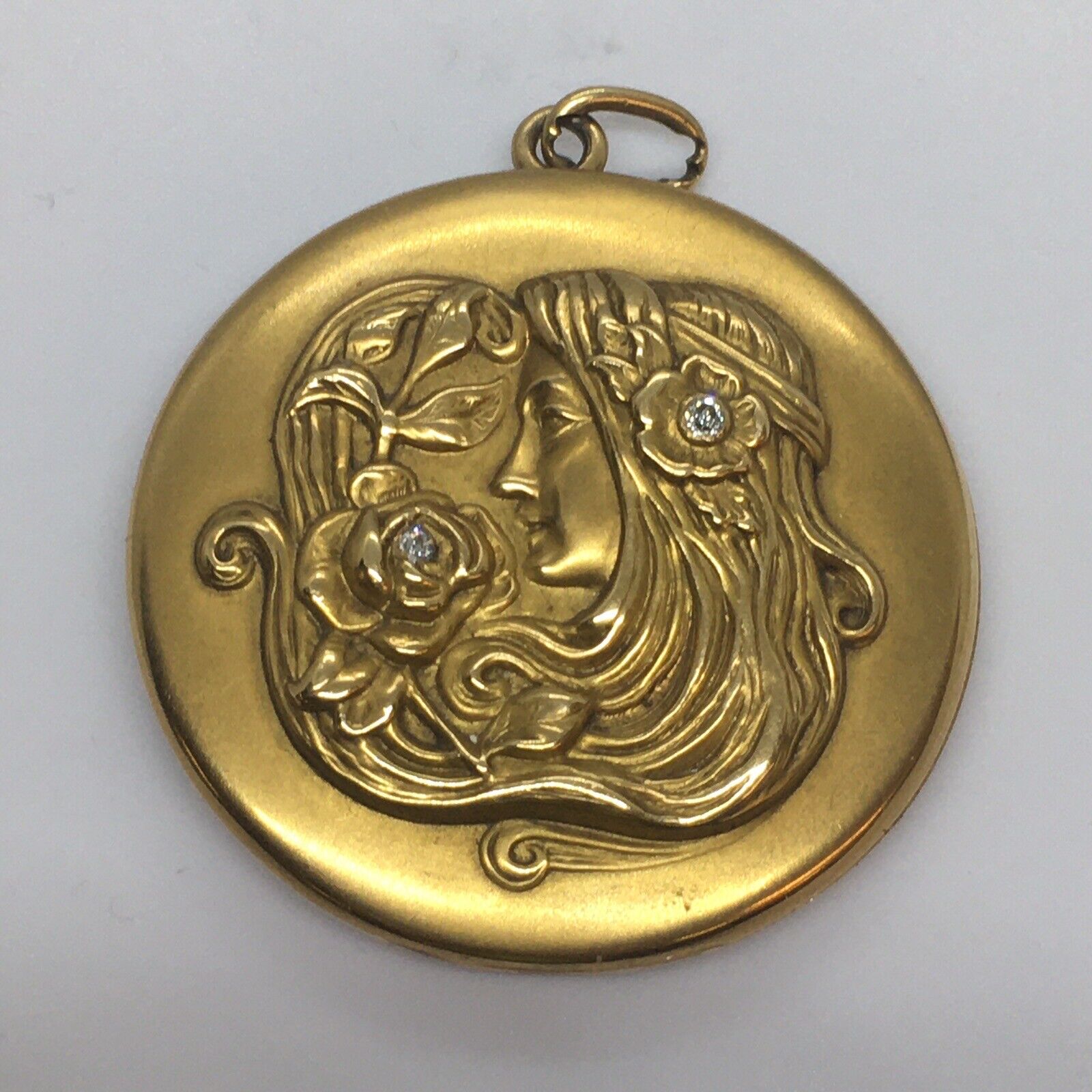 14 karat yellow gold and diamond locket, circa 1920's. Nobel Antique Jewelry Store, Santa Monica, Ca.